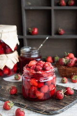 Strawberry jam in a glass jar
