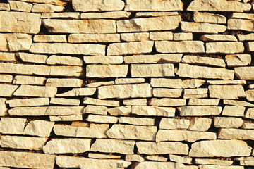 Fototapeta premium Wall of stones. Stone slabs. Can be used as a texture, background or wallpaper