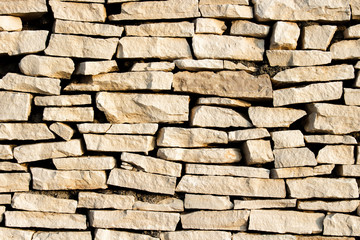 Wall of stones. Stone slabs. Can be used as a texture, background or wallpaper