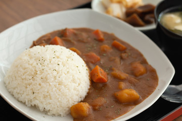 Curry rice , Japanese food on wooden table