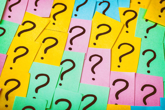 Question marks background. Colorful paper notes with question marks. Concept image. Closeup top view toned - Powered by Adobe