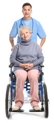 Fototapeta na wymiar Young caregiver with senior woman on white background