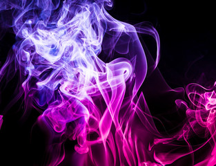Colored smoke on black background