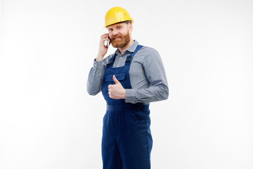 Engineer talking on the phone on a white background