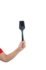Housekeeper hand holding Plastic ladle isolated on white backround