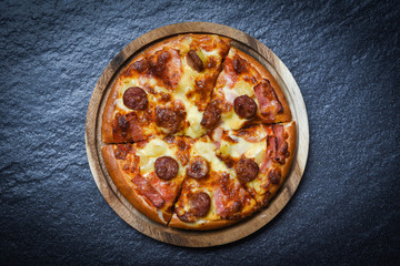 Pizza slice on wooden tray / delicious tasty fast food italian traditional pizza cheese