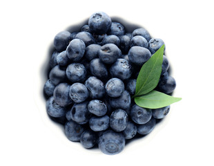 Bowl with ripe blueberry on white background