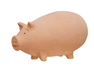 Traditional pottery, terracotta Piggy bank isolated on white. Savings or accumulation of money, banking, investment concept. Aka coin bank, money box.