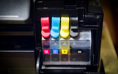 printer ink tank for refill at office - Close up printer cartridge inkjet of color black CMYK