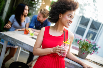 Portrait of a young black woman, model of fashion wearing dress with afro hairstyle