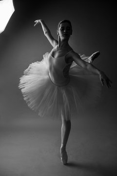 ballet dancer dancing with tutu in studio background