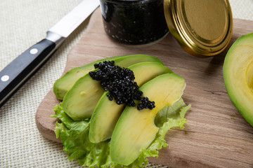 Sandwiches with black caviar