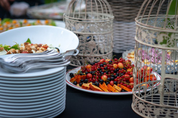 A delicious snack for a sweet festive table. Fruit at the banquet. Buffet at the wedding.  - image