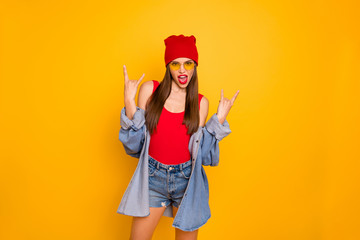 Fototapeta na wymiar Photo of funky lady bright lips nice colorful look visit rock concert famous group band hand show horns symbol wear sun specs red body tank-top denim blazer