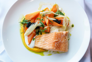 Delicious homemade sea Trout with roasted carrot , pickled fennel , yoghurt and Herring Roe