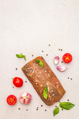 Raw pork loin with vegetables, species and herbs