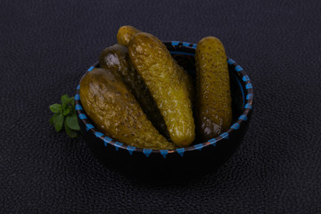 Pickled cucumbers heap in the bowl