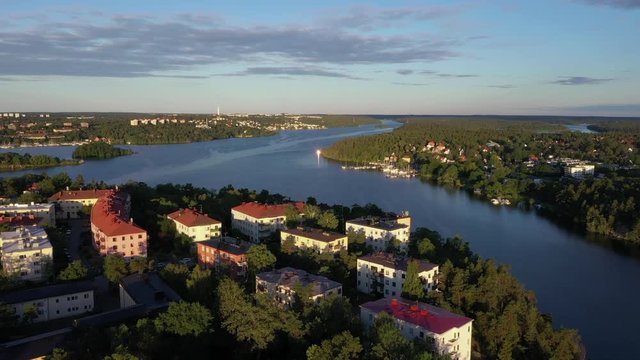 Aerial footage of the Stockholm island Stora Essingen and its western shore in morning light