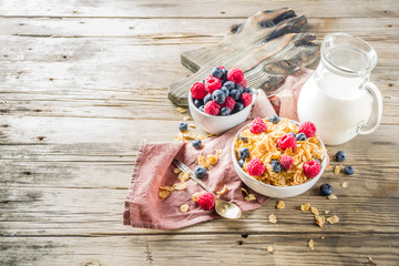 Healthy Corn Flakes for Breakfast with Milk and fresh summer berries