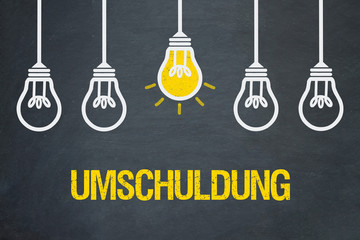Umschuldung / Tafel mit Glühbirnen