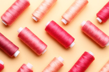 Color sewing threads on paper background