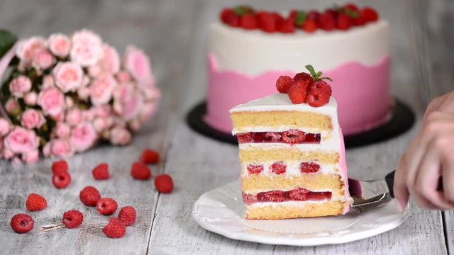 Raspberry cream cake with jelly, close up.