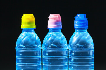 Naklejka premium Mineral pure water bottles. Healthy living concept