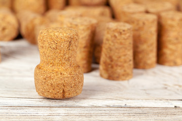 Bunch of wine corks on wooden table