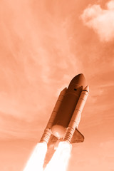 Dramatic rocket launch.  The elements of this image furnished by NASA.