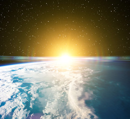 Sunrise on earth. The elements of this image furnished by NASA.