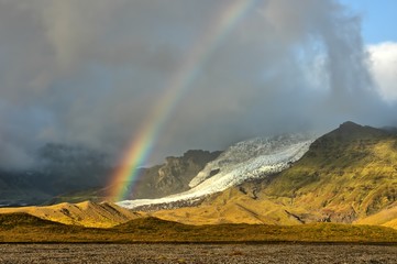 Vatnajökull National Park with rainbow over glacier