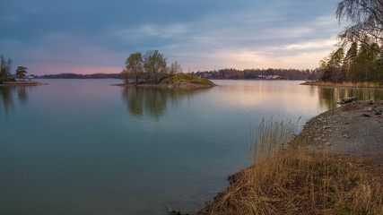 Landscape A small stone island in the Gulf of Finland near Helsinki in Finland at sunset