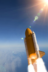 Rocket and light. The elements of this image furnished by NASA.