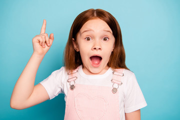 Close up photo of cute stylish kid raise index finger show scream shout isolated blue background