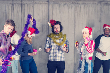 multiethnic group of casual business people having new year party