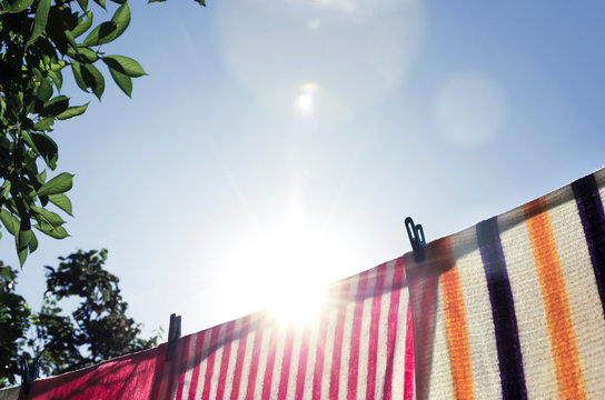 Towels Dried On Washing Line Outdoor.Sunlight In The Morning