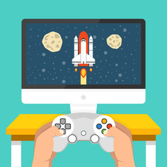 Gaming concept. Man holding in hands gamepad and playing in rocket videogame. Flat cartoon style. Vector illustration.