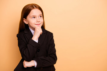 Portrait of her she nice attractive cute lovely dreamy cheerful sweet pre-teen girl learner wearing formal jacket blazer science knowledge isolated over beige pastel background