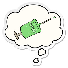 cartoon syringe needle and thought bubble as a printed sticker