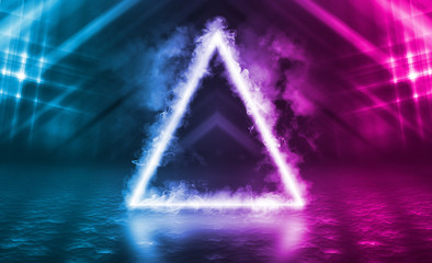 Empty background scene. Dark reflection of the street on the wet asphalt. Rays of neon light in the dark, neon figure of a triangle, smoke. Background of empty stage show. Abstract dark background.