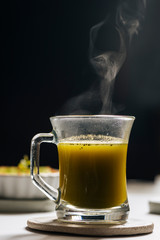 Hot matcha tea in transparent cups