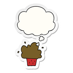 cartoon cupcake and thought bubble as a printed sticker