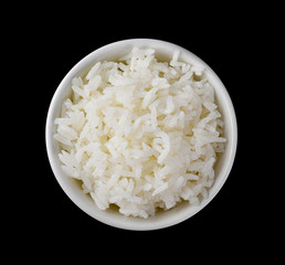 rice in white bowl on black background