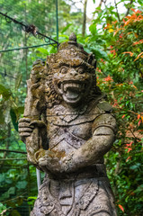 Fototapeta na wymiar Statue in Hindu temple in Sacred Monkey Forest