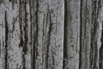 Obraz premium Overflowing cement from the beam