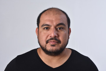 portrait of latin american man on white