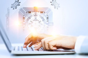 Businesswoman hands on laptop on tech background. Mixed media