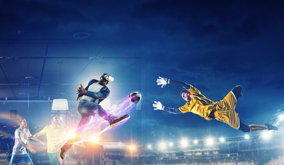 Soccer players on stadium in action. Mixed media