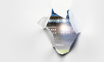 Paper torn hole effect with stadium view