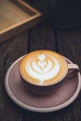 Hot latte coffee in the cup